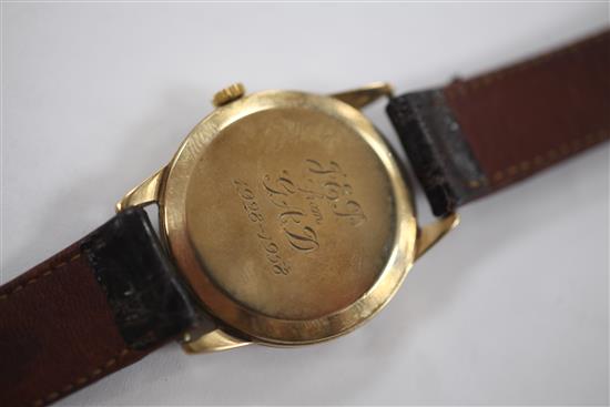 A gentlemans late 1950s 9ct gold Omega manual wind wrist watch,